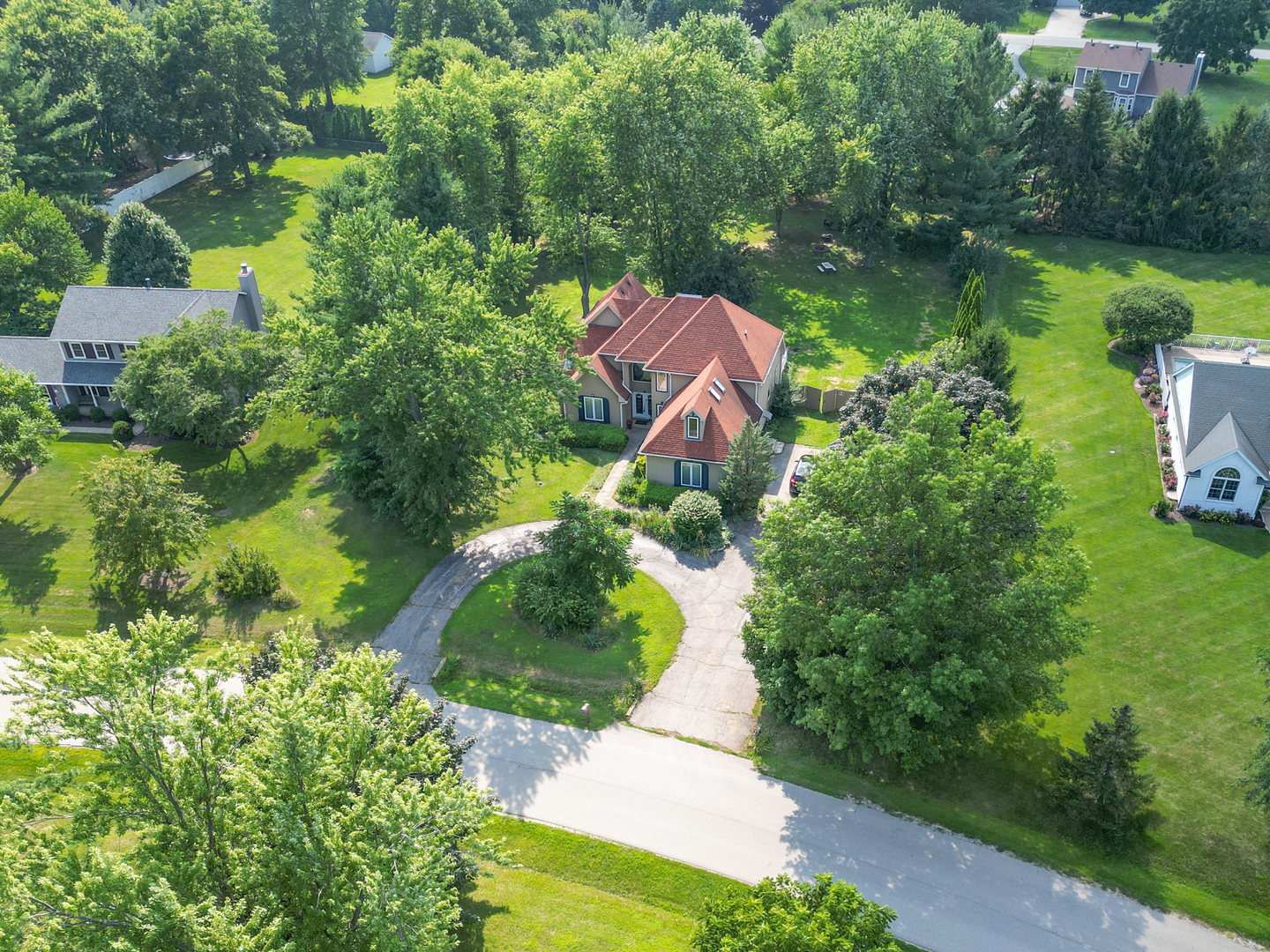 9817 North Hunters Lane Spring Grove, IL 60081 - Photo 68 of 73 a backyard of a house with a yard and outdoor seating