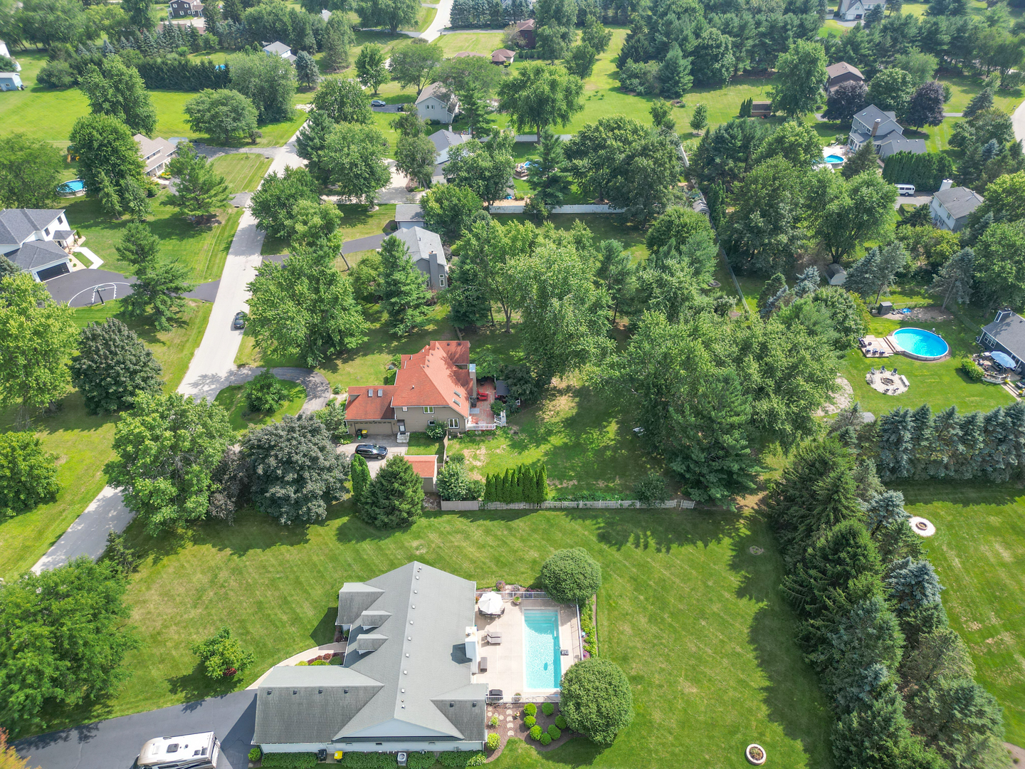 9817 North Hunters Lane Spring Grove, IL 60081 - Photo 72 of 73 a view of a lake with a house