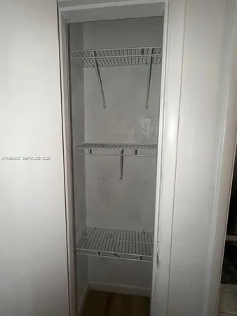 a bathroom with a glass door