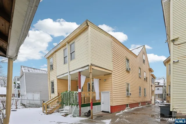 a car parked in front of a house