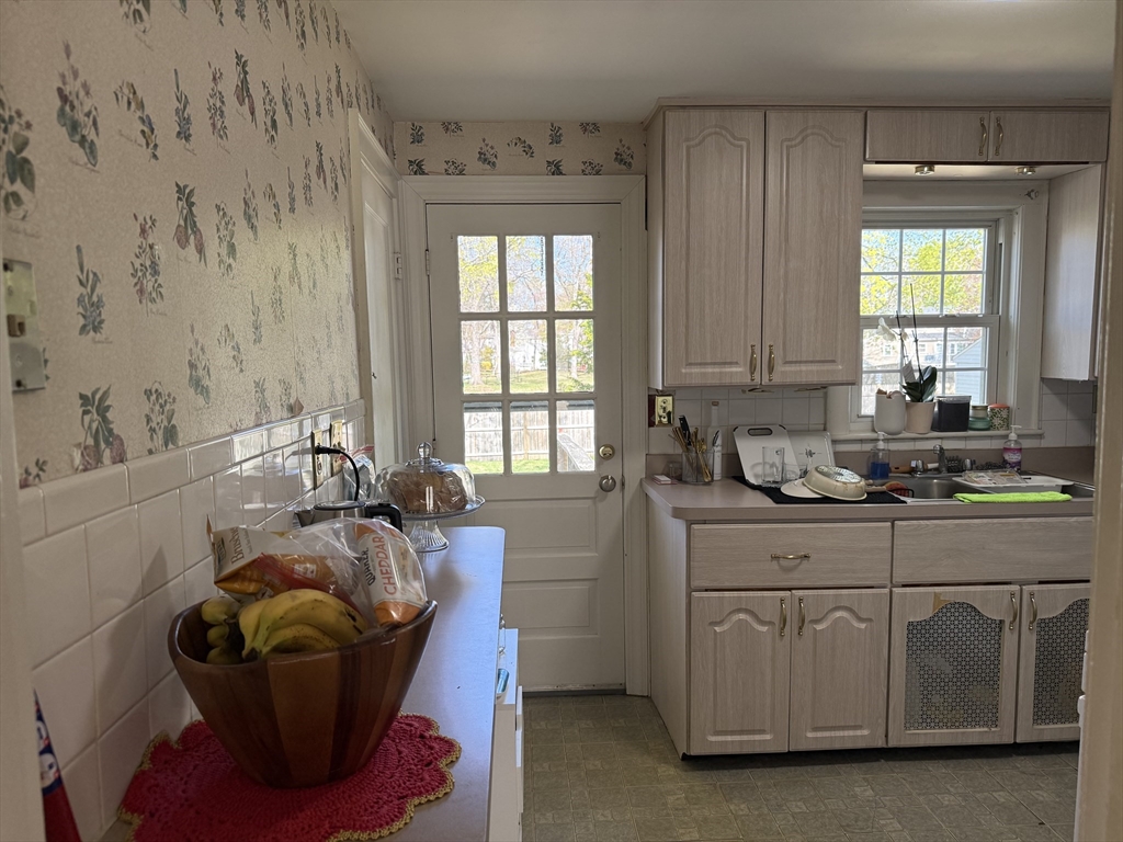45 McPhee Road, Unit 1 Framingham, MA 01701 - Photo 6 of 11 a bedroom with a bed and window
