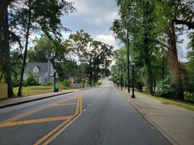 a view of a street with a houses
