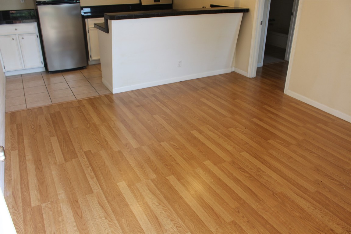 304 East 33rd Street, Unit 19 Austin, TX 78705 - Photo 15 of 15 a view of empty room with wooden floor