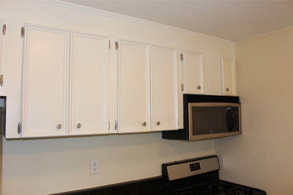 304 East 33rd Street, Unit 19 Austin, TX 78705 - Photo 7 of 15 a view of room with cabinets