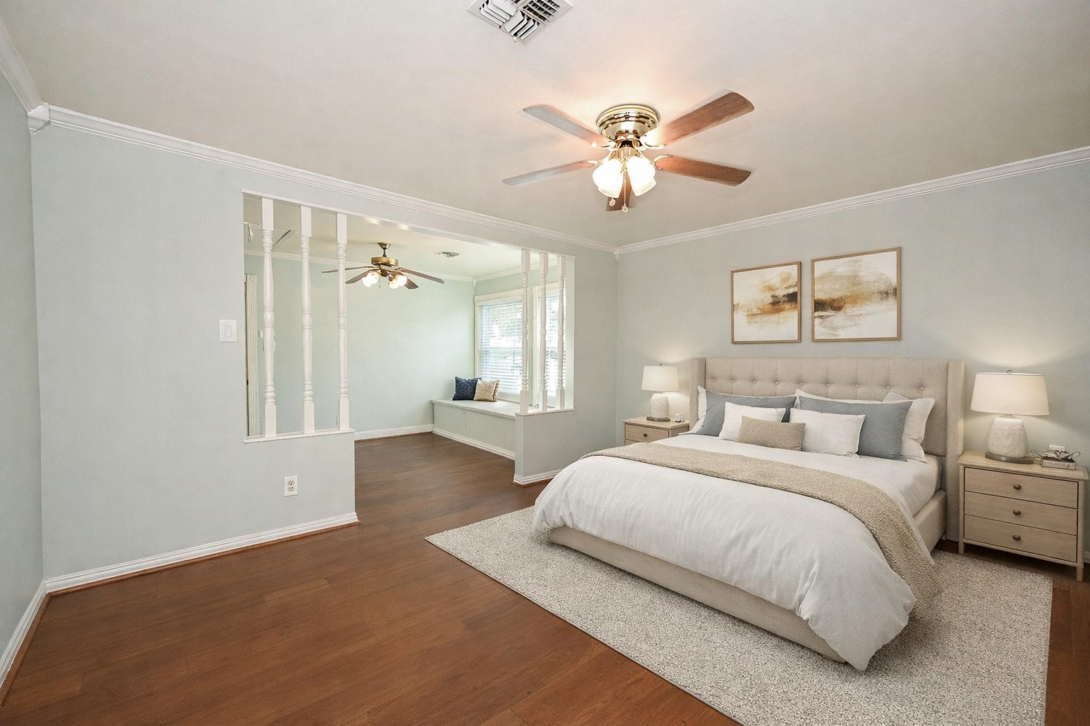 1707 Key Street Waller, TX 77484 - Photo 11 of 26 a bedroom with a large bed and a chandelier