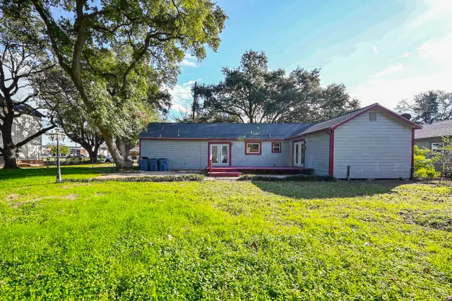 a house view with a garden space