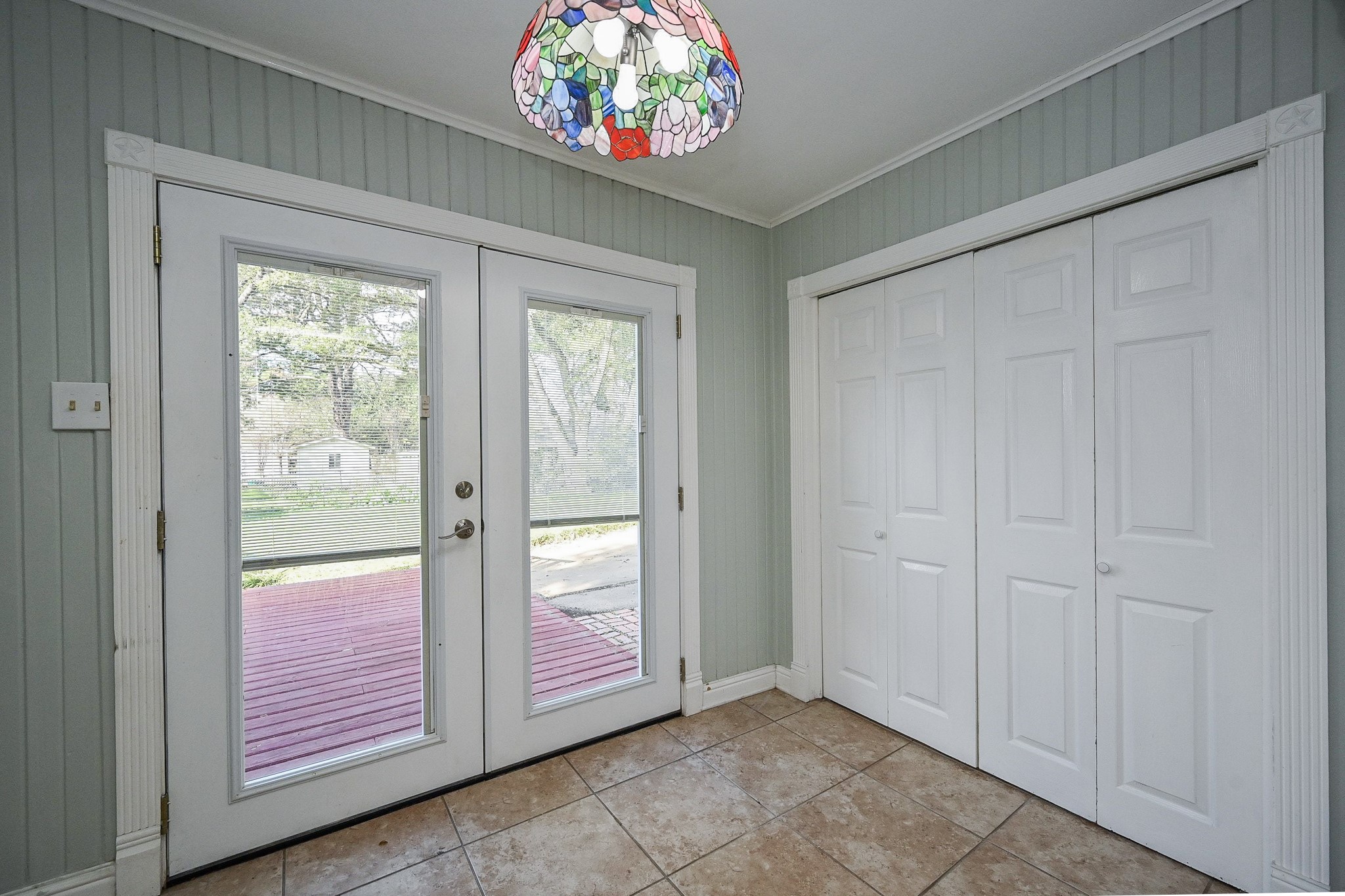 1707 Key Street Waller, TX 77484 - Photo 8 of 26 wooden floor in an empty room with a window