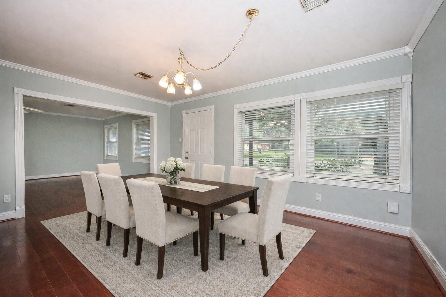 1707 Key Street Waller, TX 77484 - Photo 10 of 26 a view of a dining room with furniture window and wooden floor