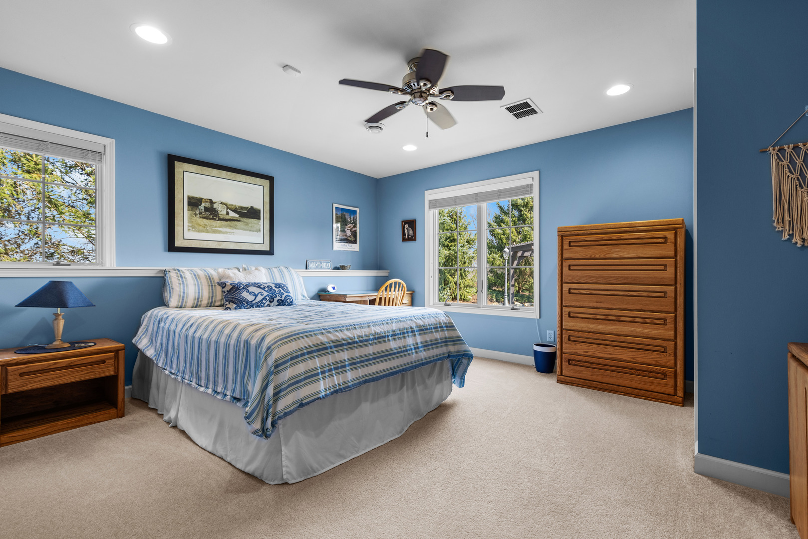 10125 Creek Ridge Trail Belvidere, IL 61008 - Photo 29 of 41 a spacious bedroom with a bed and a ceiling fan