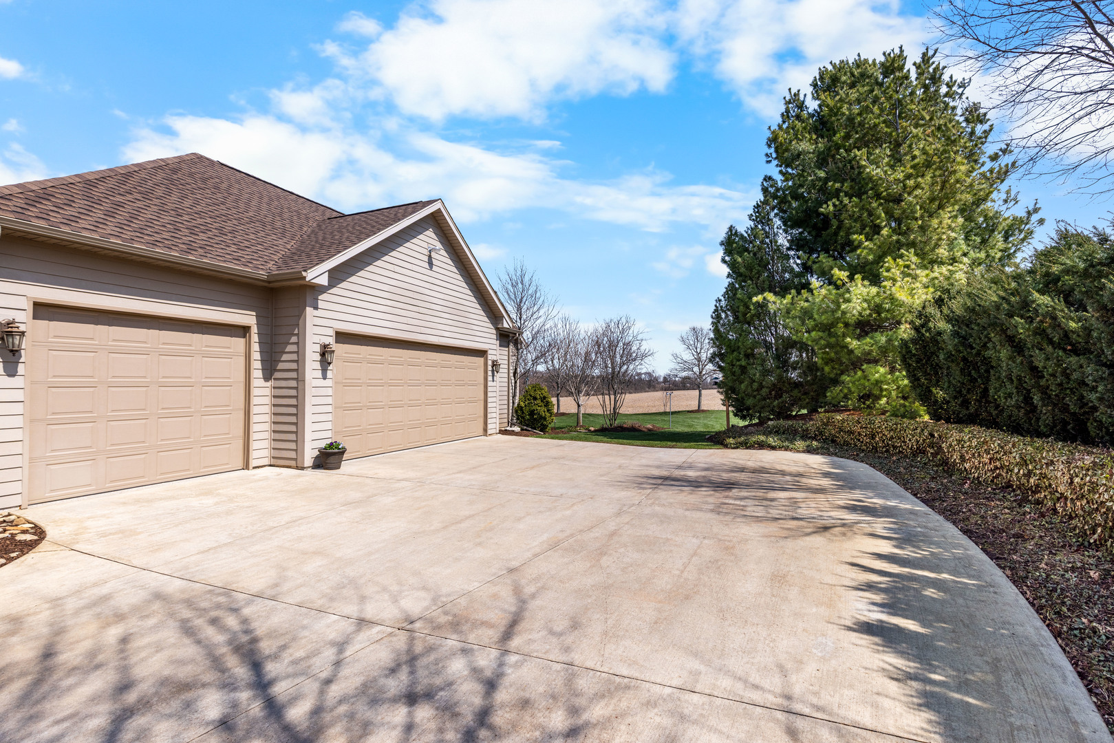 10125 Creek Ridge Trail Belvidere, IL 61008 - Photo 39 of 41 a front view of a house with a yard and garage