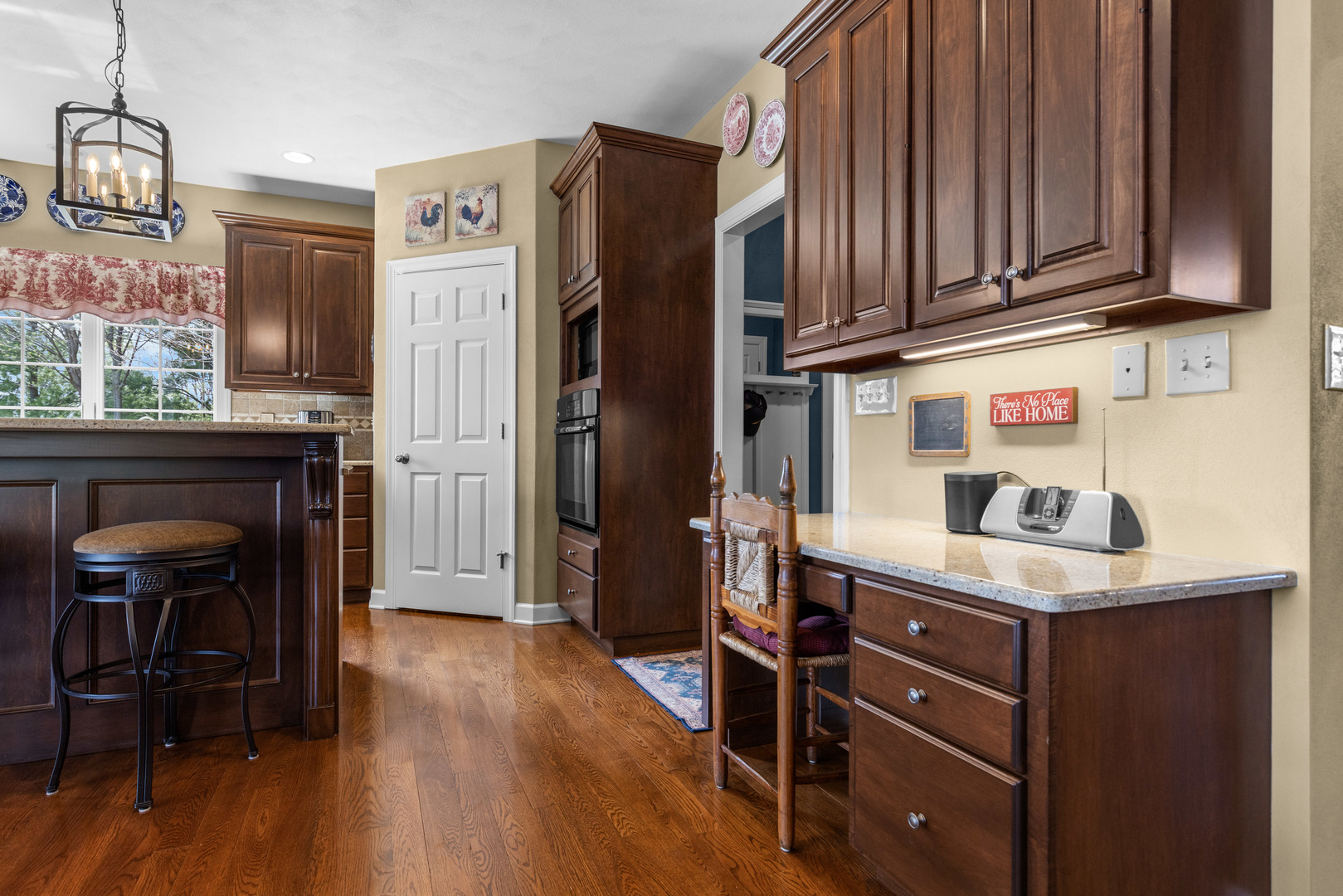 10125 Creek Ridge Trail Belvidere, IL 61008 - Photo 5 of 41 a kitchen with stainless steel appliances granite countertop a refrigerator and a stove top oven