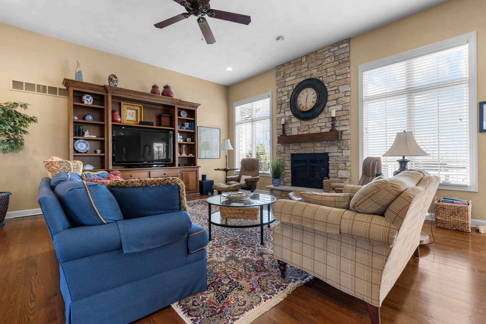 10125 Creek Ridge Trail Belvidere, IL 61008 - Photo 9 of 41 a living room with furniture a rug and a fireplace