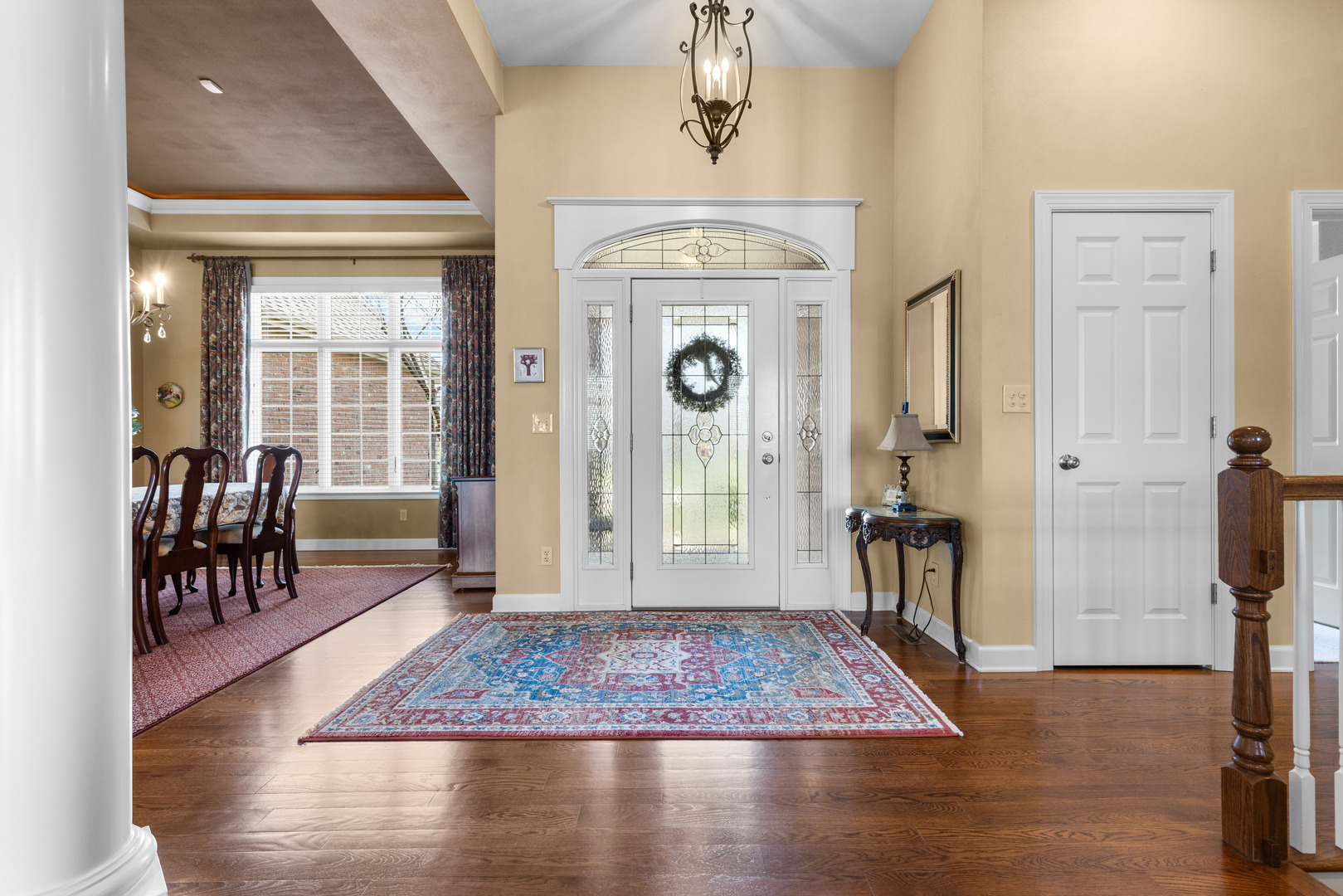 10125 Creek Ridge Trail Belvidere, IL 61008 - Photo 10 of 41 a view of a hallway with furniture and floor to ceiling window