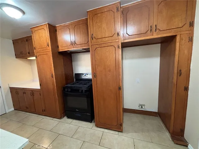 a bathroom with a sink vanity and mirror