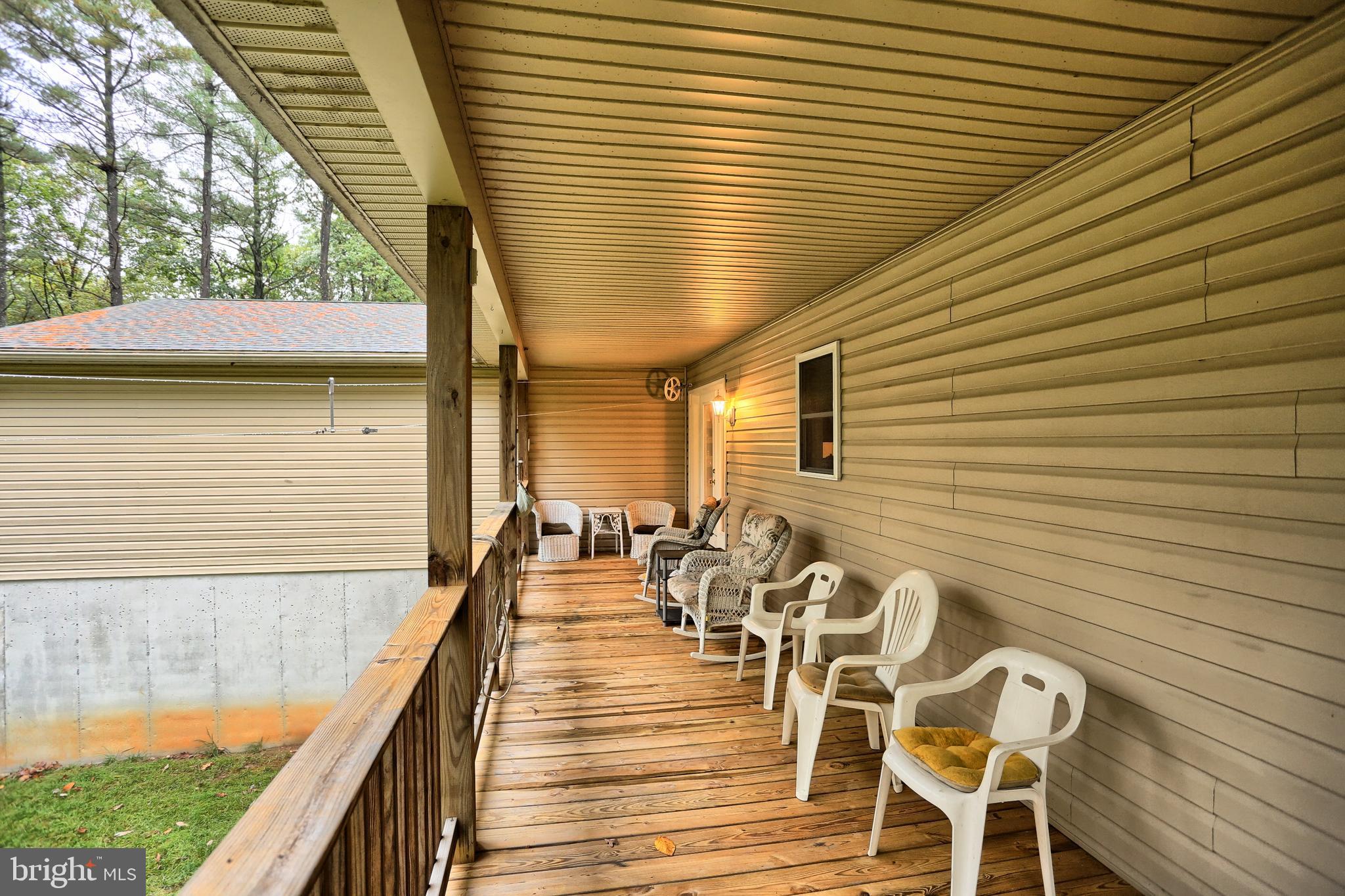 1394 Paige Ridge Road New Bloomfield, PA 17068 - Photo 33 of 49 You'll love this covered deck!