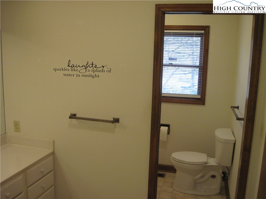 281 Old Turnpike Road Banner Elk, NC 28604 - Photo 14 of 22 a bathroom with a toilet and a sink