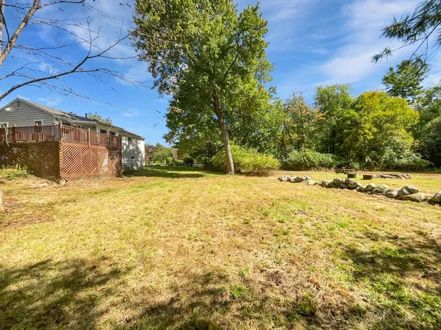 a view of yard covered with snow