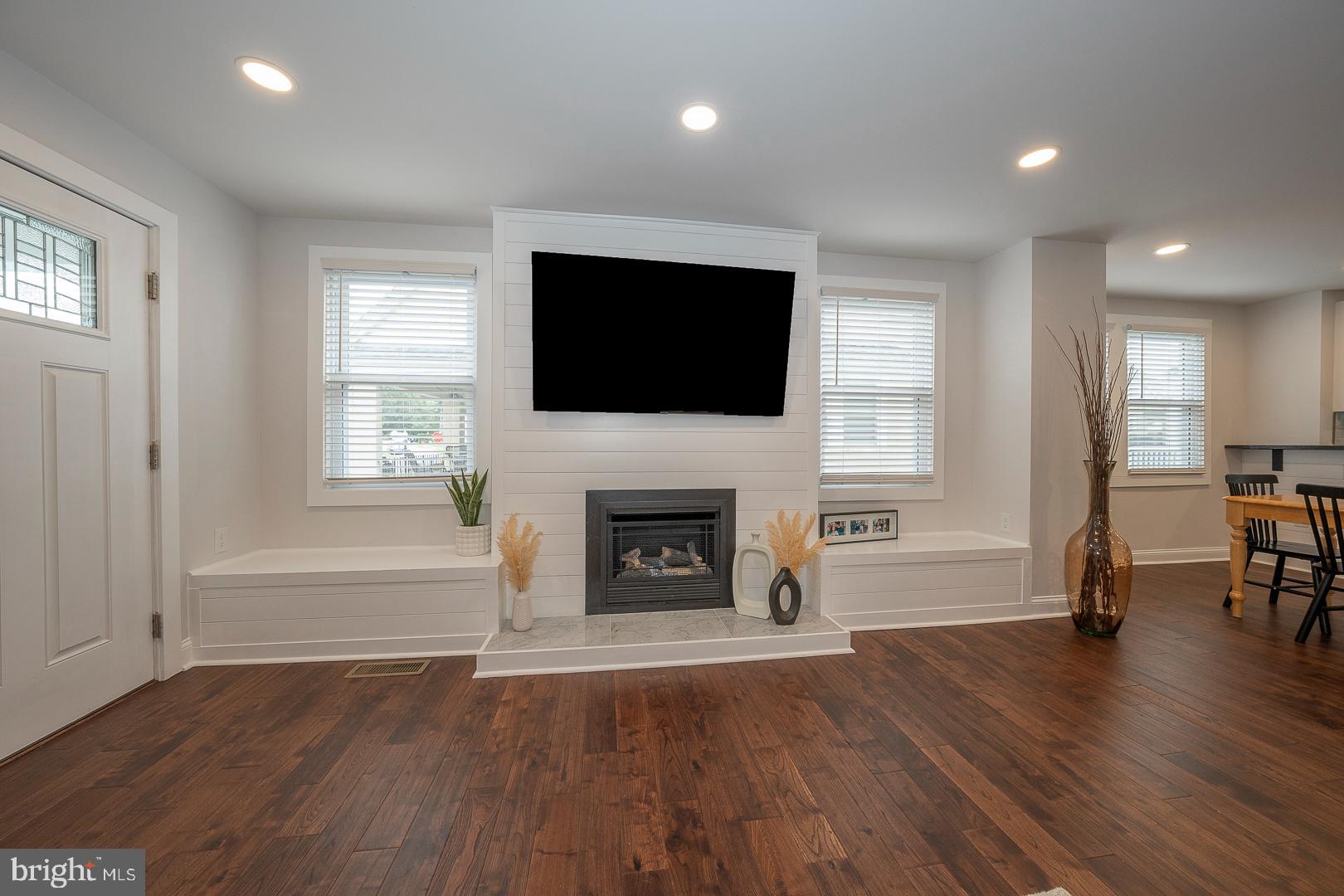 2727 Oakford Road Ardmore, PA 19003 - Photo 5 of 31 Living Room with Gas Log Fireplace & Window Seats