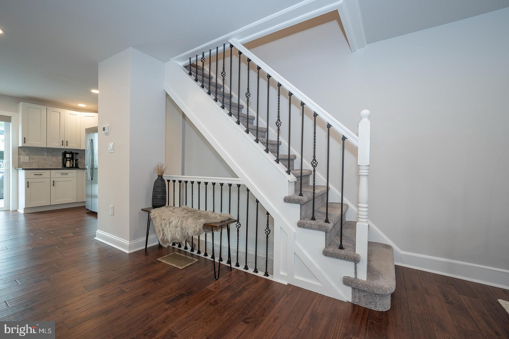 2727 Oakford Road Ardmore, PA 19003 - Photo 7 of 31 Stairway to Second Floor w/ Wrought Iron Balusters
