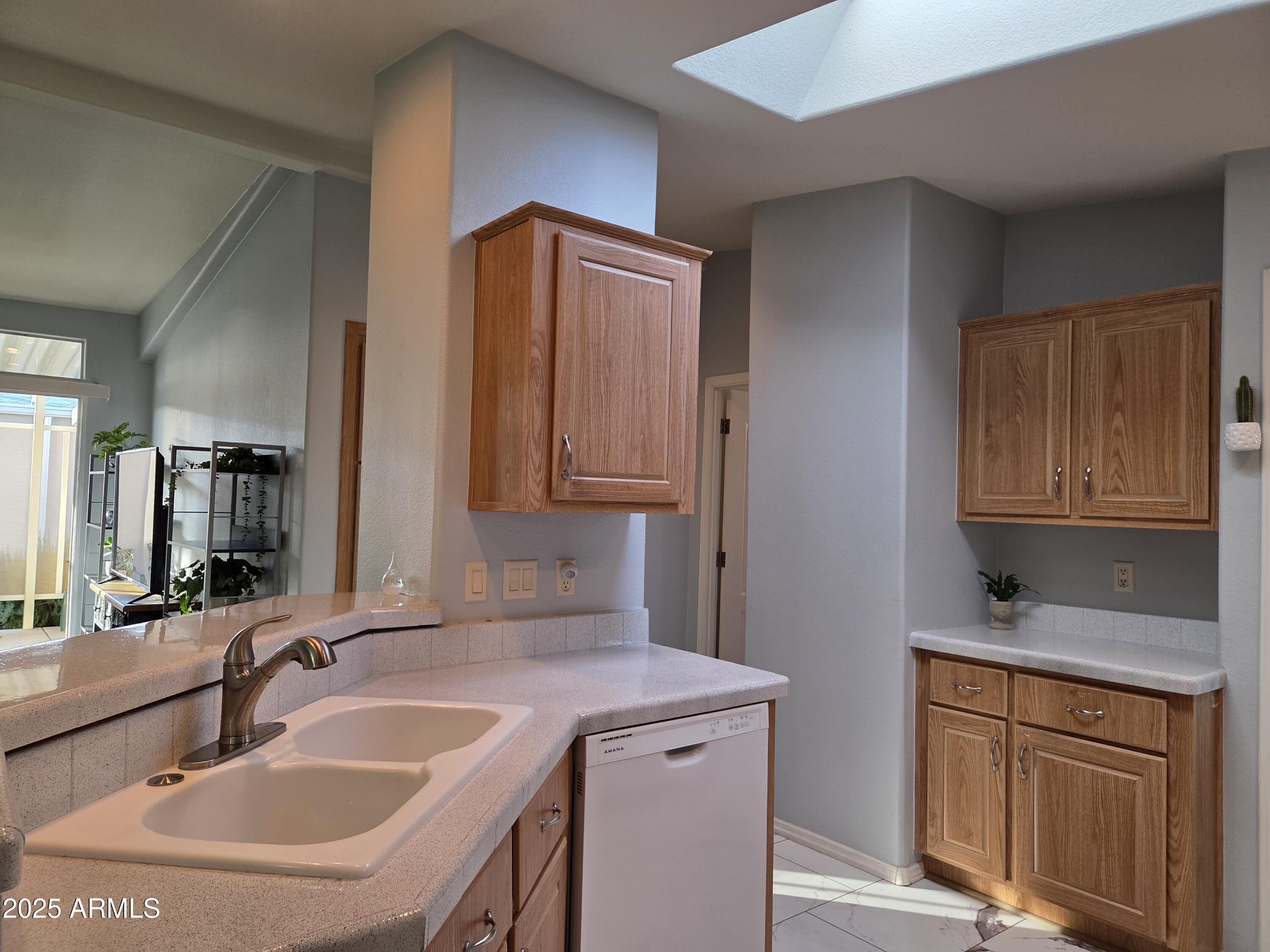 2929 East Main Street, Unit 107 Mesa, AZ 85213 - Photo 12 of 42 a bathroom with a sink and a mirror