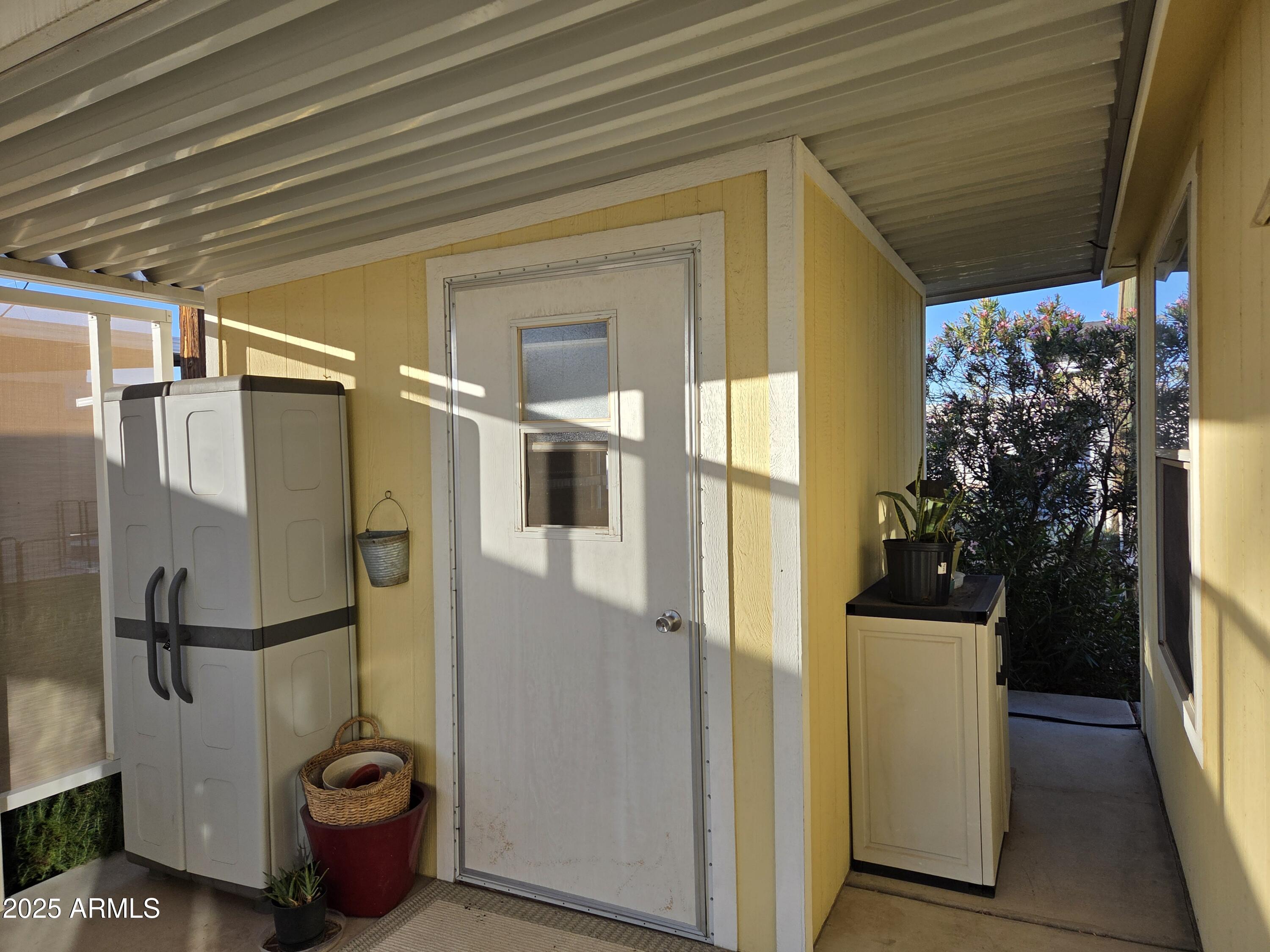 2929 East Main Street, Unit 107 Mesa, AZ 85213 - Photo 31 of 42 a view of a entryway door of the house