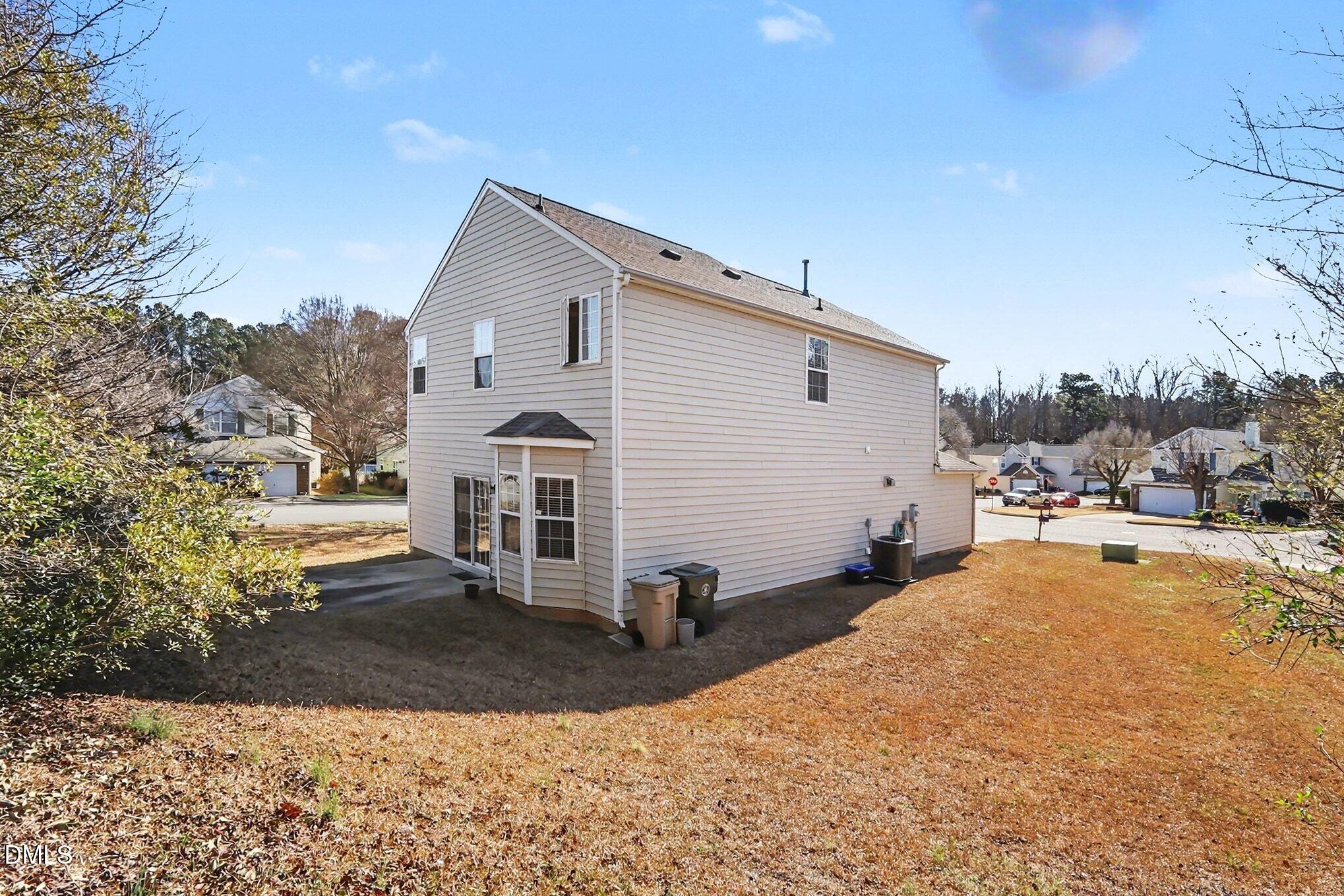 100 Rocca Circle Raleigh, NC 27603 - Photo 24 of 27 a view of a white house covered with snow in front of it