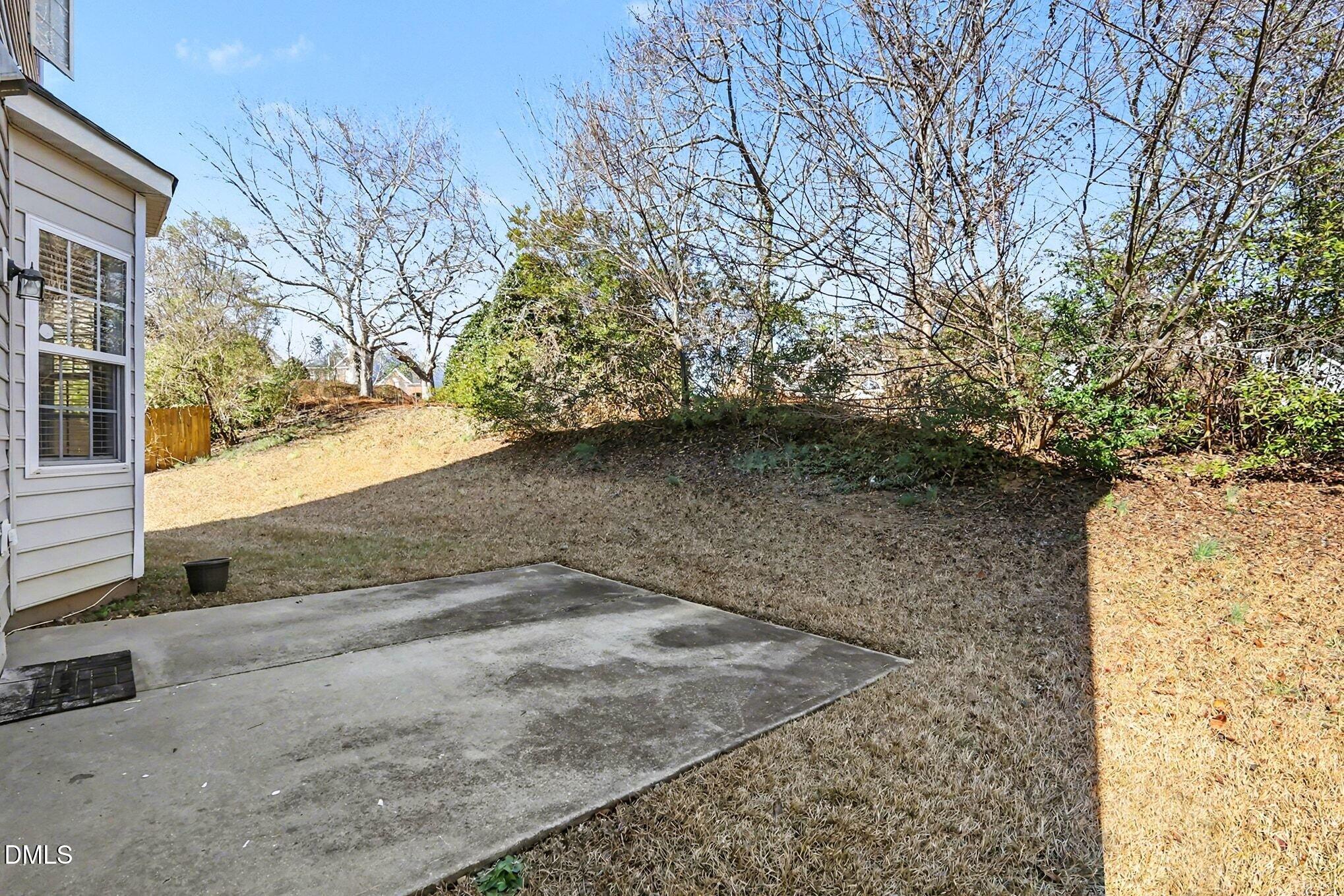 100 Rocca Circle Raleigh, NC 27603 - Photo 25 of 27 a view of a backyard of the house