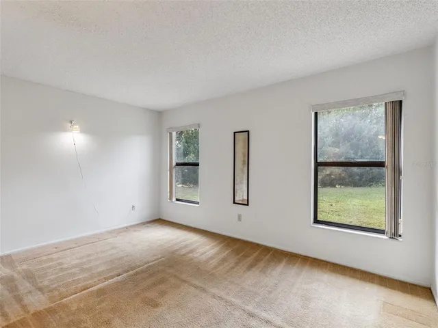 a view of a workspace with furniture