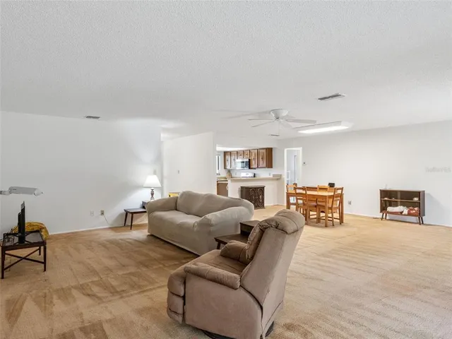 a living room with furniture and a couch