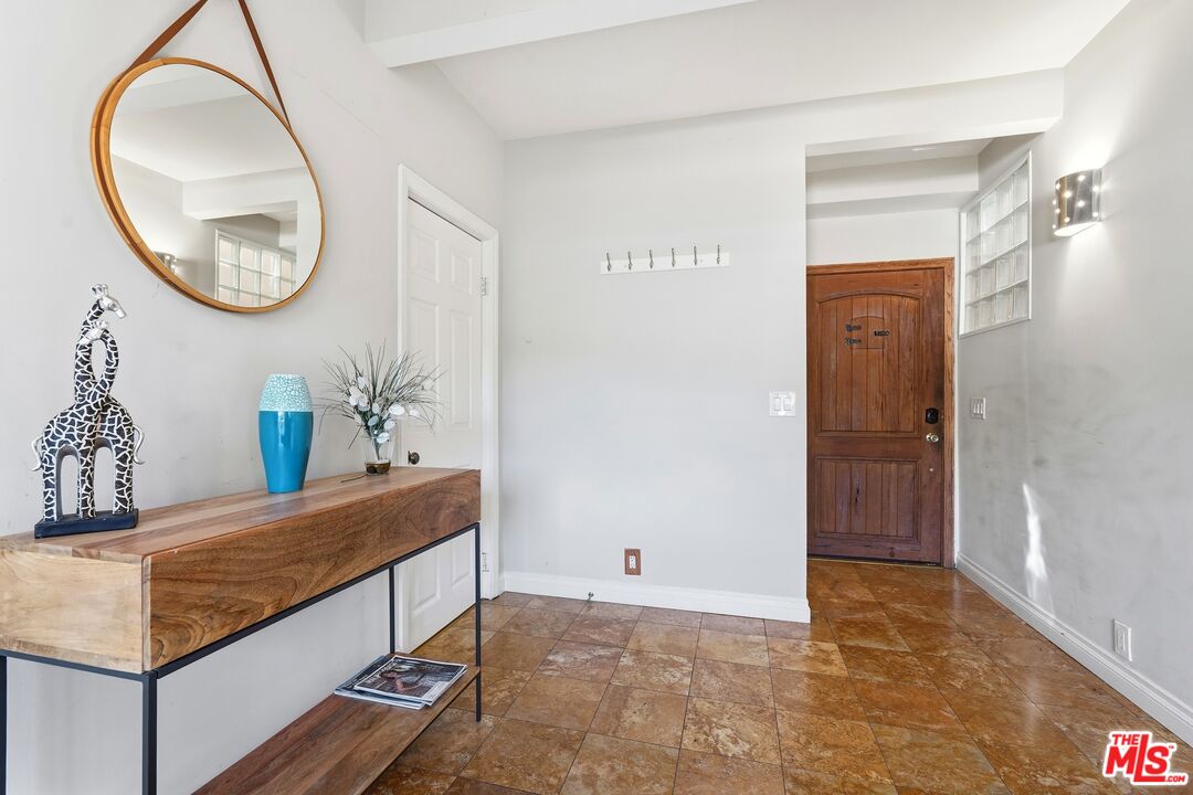 2955 Corral Canyon Road Malibu, CA 90265 - Photo 4 of 21 a room with a mirror and a dresser