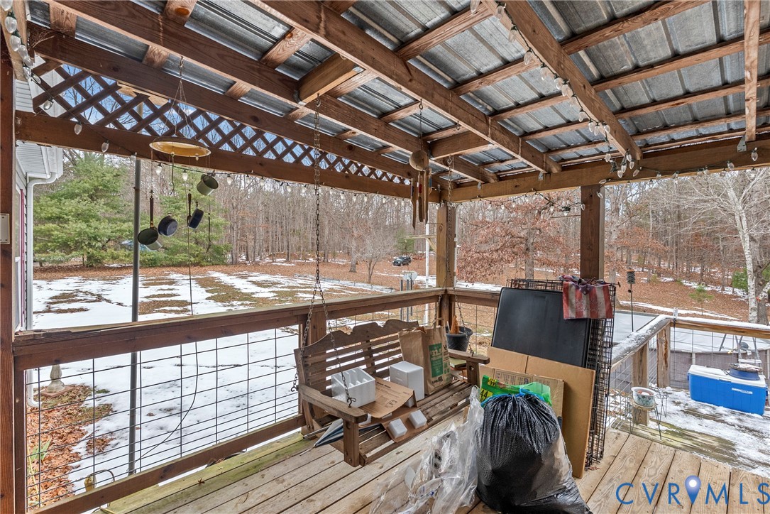 9174 Howardsville Road Howardsville, VA 24562 - Photo 29 of 50 a view of a balcony with wooden floor