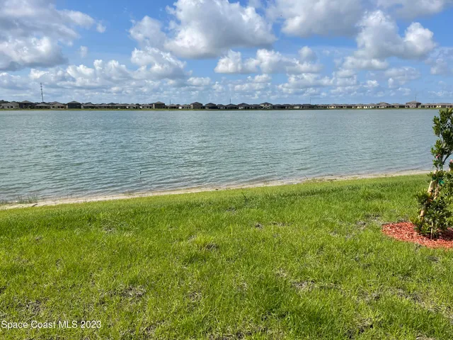 a view of a lake from a yard