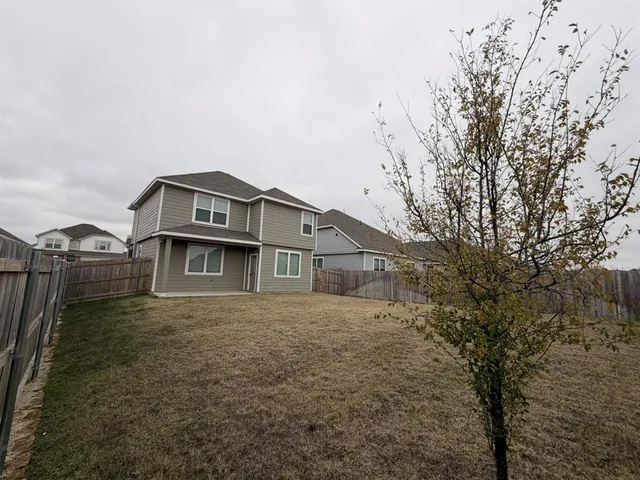 a house view with a outdoor space