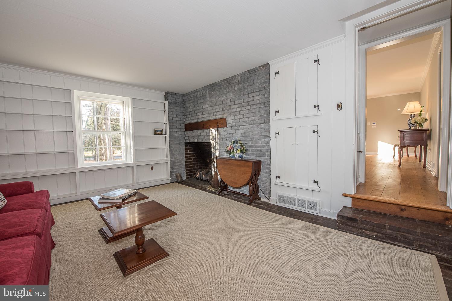135 Grubb Road Malvern, PA 19355 - Photo 17 of 45 Cozy library w gas log fire and built-ins