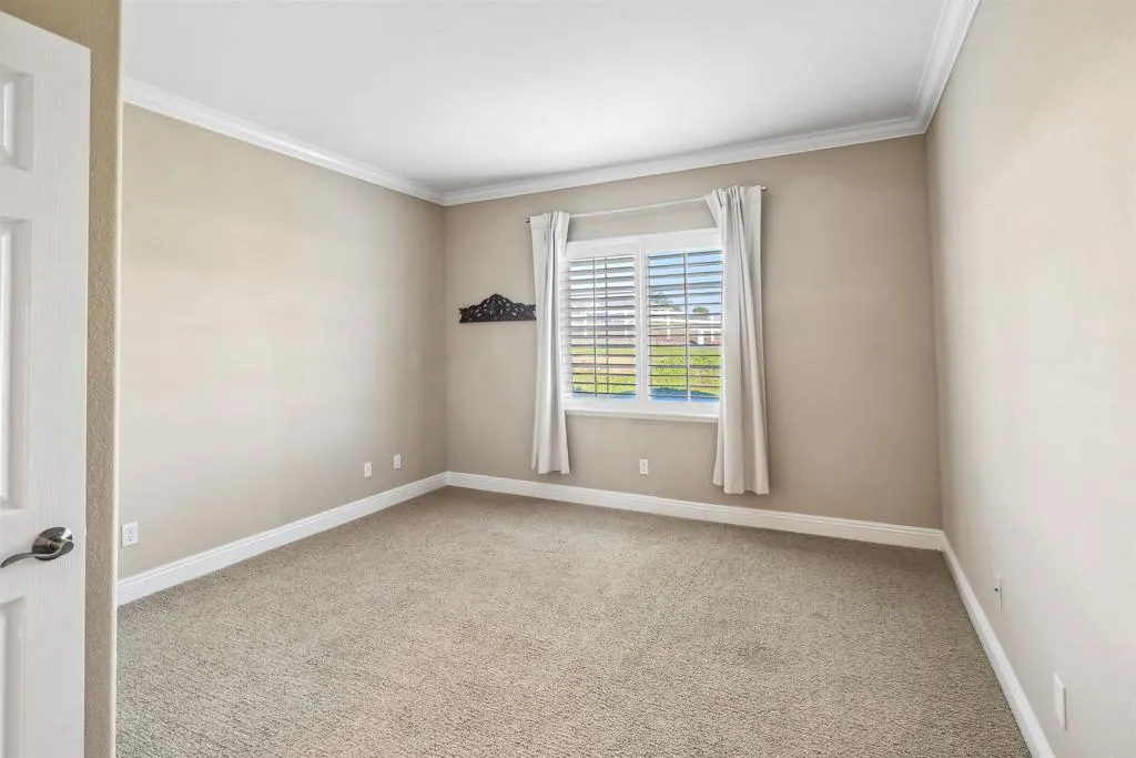 13371 Sage Meadow Lane, Unit 1 Valley Center, CA 92082 - Photo 13 of 38 an empty room with windows