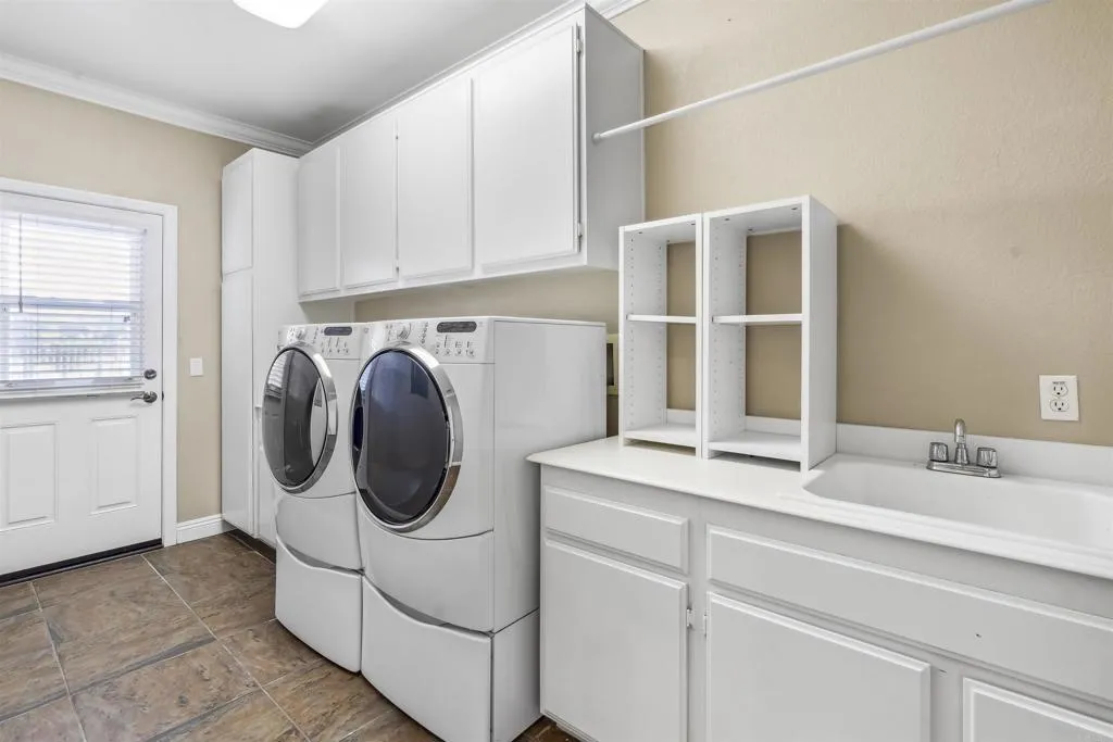 13371 Sage Meadow Lane, Unit 1 Valley Center, CA 92082 - Photo 20 of 38 a utility room with sink dryer and washer