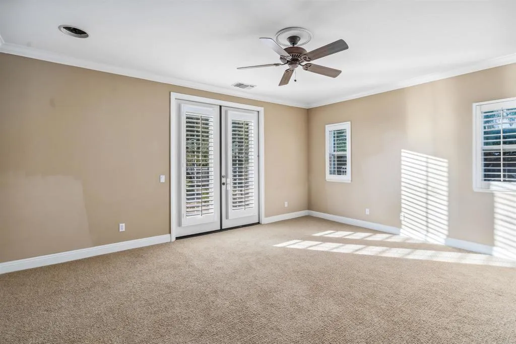 13371 Sage Meadow Lane, Unit 1 Valley Center, CA 92082 - Photo 28 of 38 a view of a livingroom with a ceiling fan and window