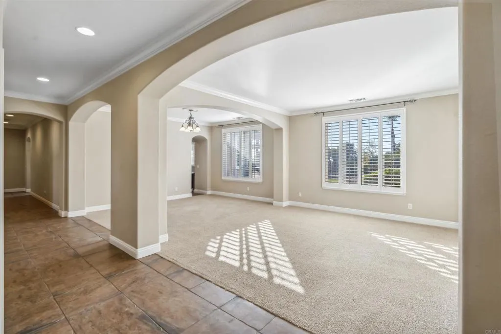13371 Sage Meadow Lane, Unit 1 Valley Center, CA 92082 - Photo 6 of 38 an empty room with windows