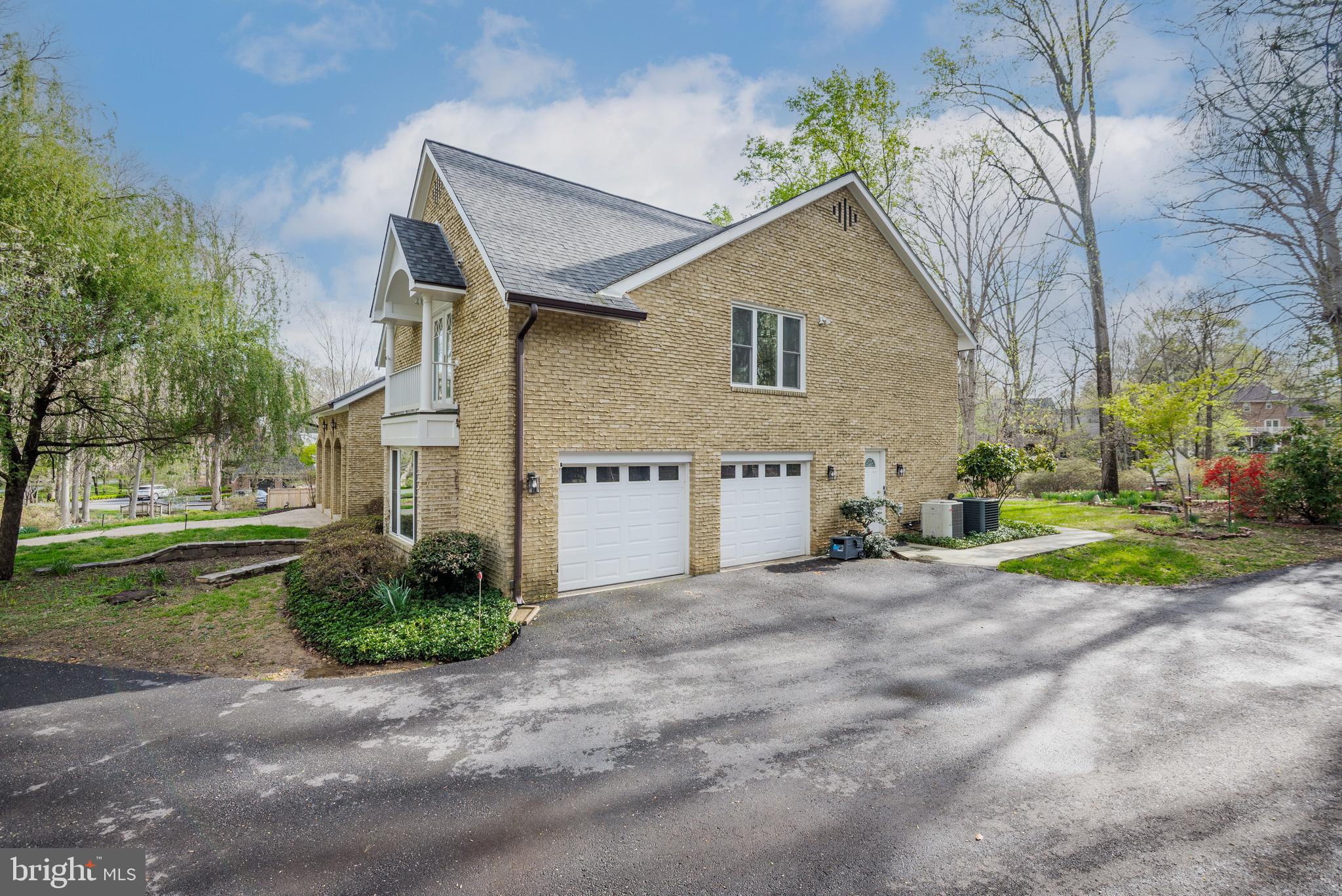 10100 Iron Gate Road Potomac, MD 20854 - Photo 12 of 16 a view of a house with a yard