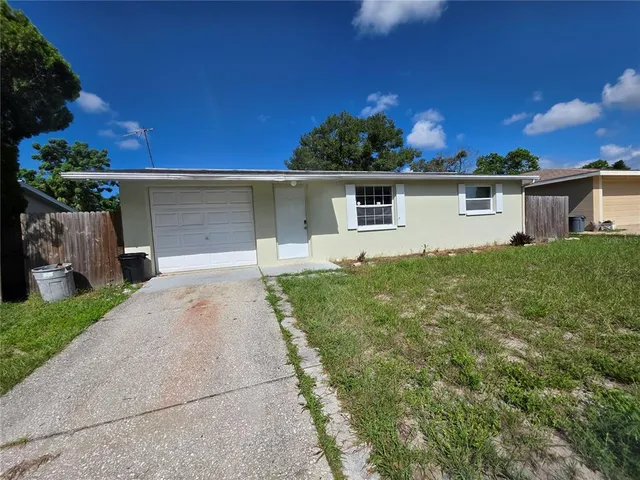 front view of house with a yard
