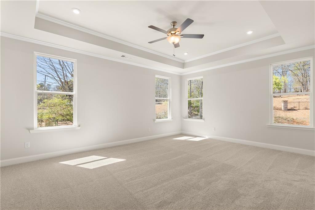 900 Melody Ridge Lane Buford, GA 30518 - Photo 19 of 30 a view of an empty room with a window