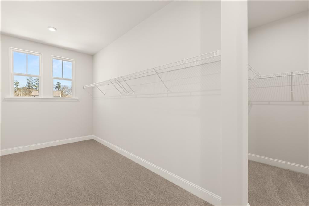 900 Melody Ridge Lane Buford, GA 30518 - Photo 24 of 30 a view of a small space with wooden floor and a window