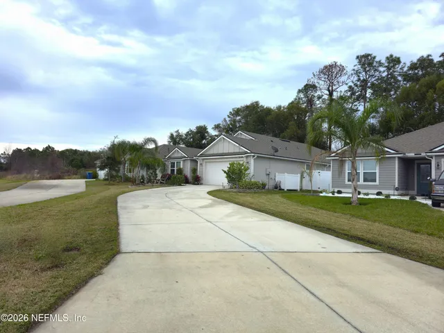 a view of house with outdoor space and street view