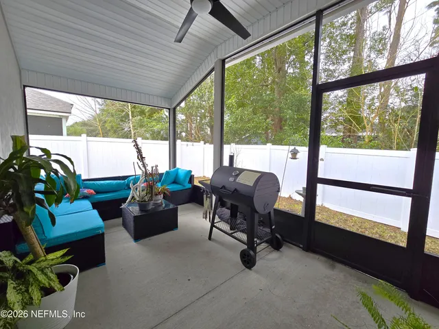 a backyard of a house with a garage