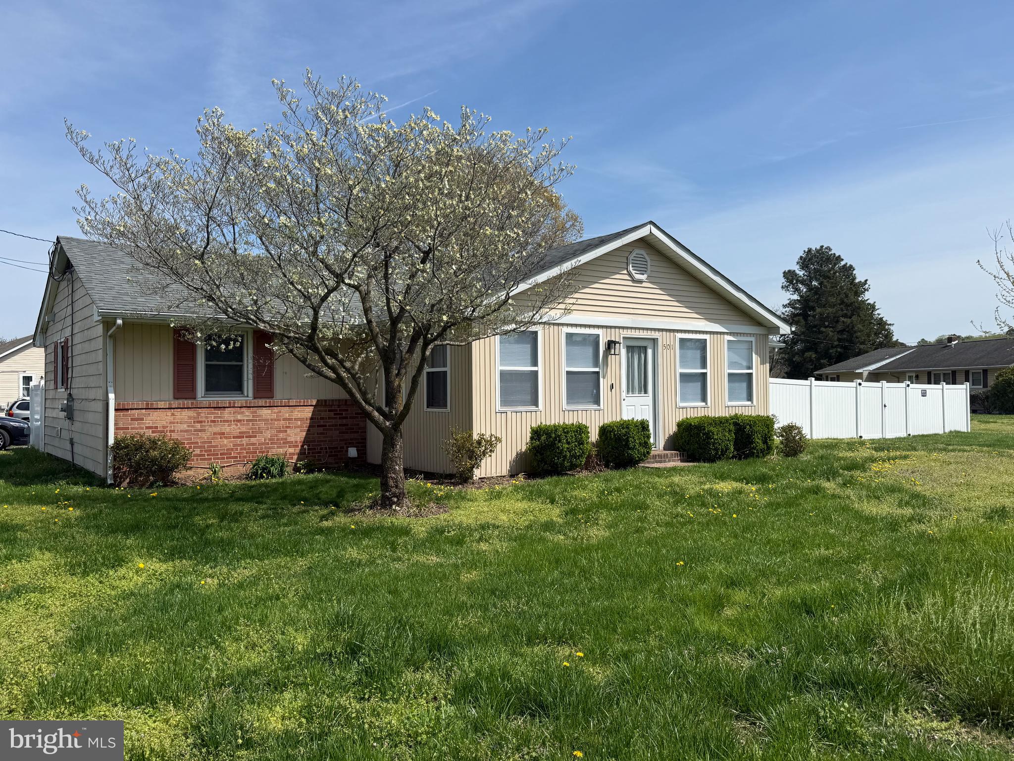 501 Chestnut Street Hebron, MD 21830 - Photo 1 of 30 a front view of a house with a yard