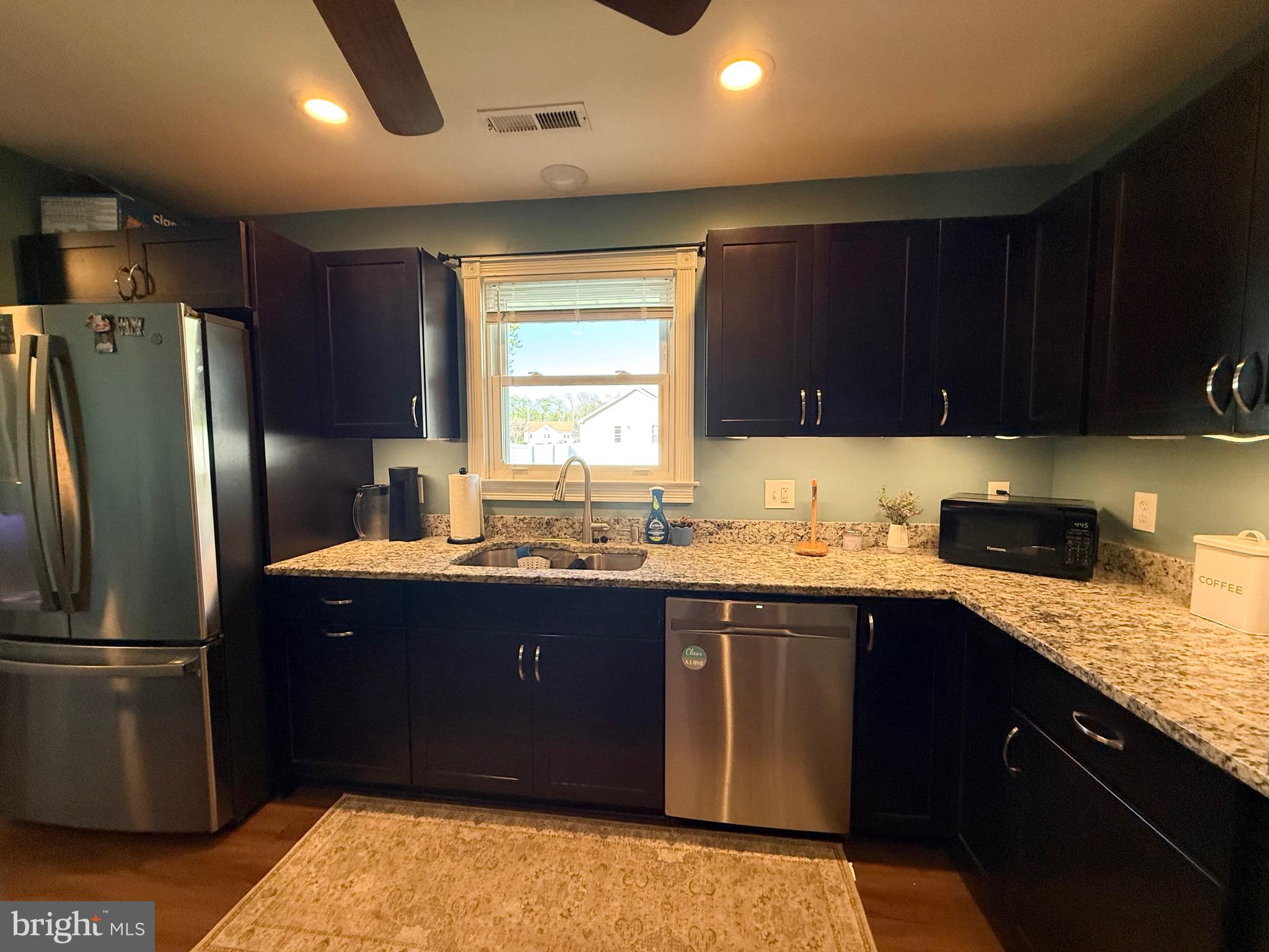 501 Chestnut Street Hebron, MD 21830 - Photo 14 of 30 a kitchen with stainless steel appliances granite countertop a refrigerator a sink dishwasher a stove and a refrigerator