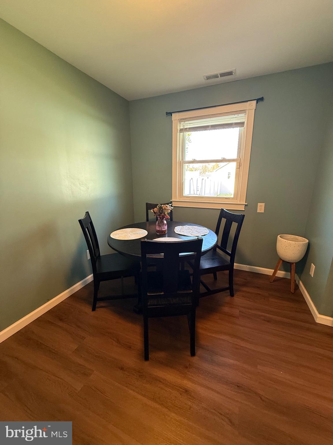501 Chestnut Street Hebron, MD 21830 - Photo 15 of 30 a view of a dining room with furniture and a window