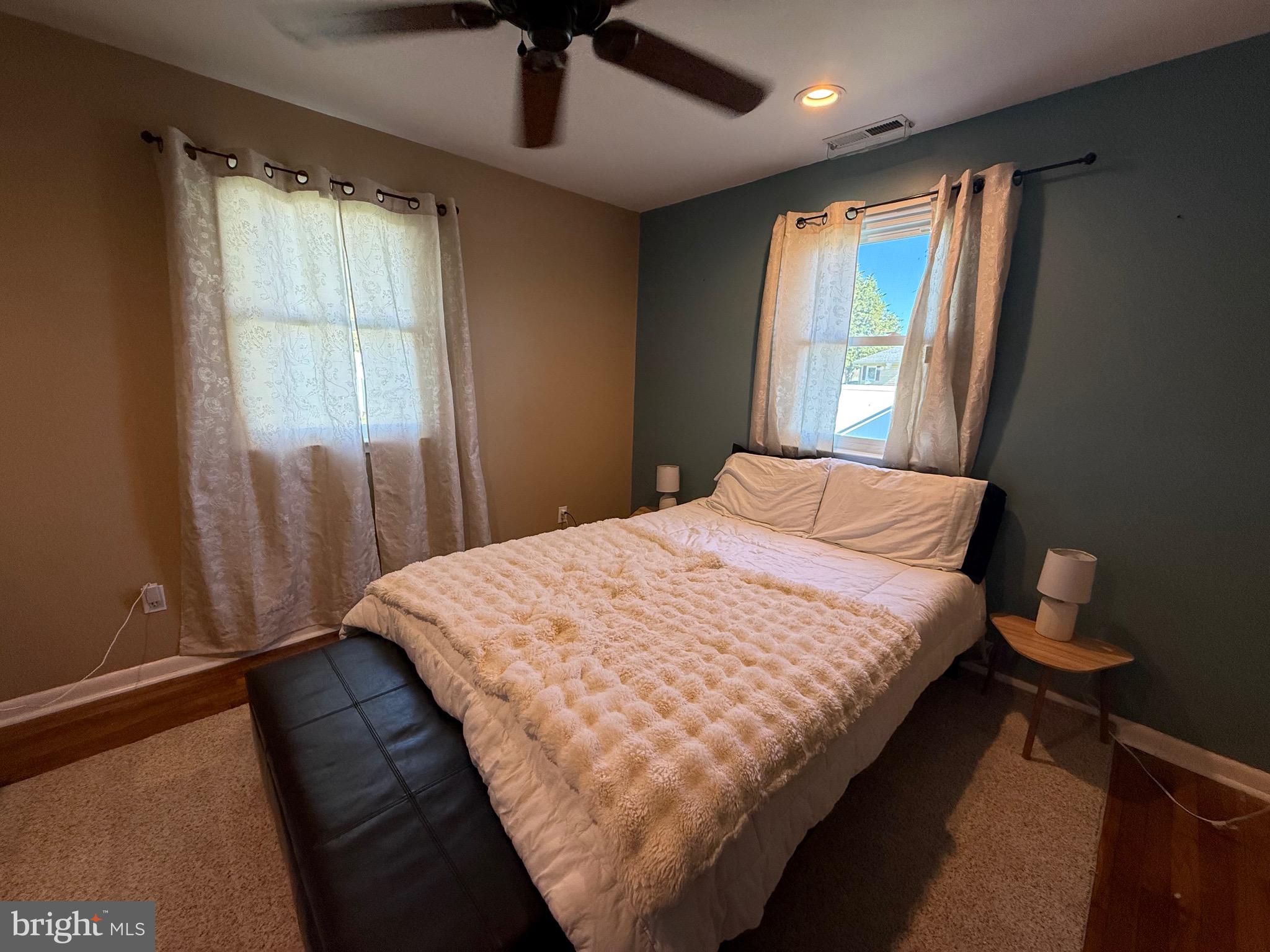 501 Chestnut Street Hebron, MD 21830 - Photo 21 of 30 a bed sitting in a bedroom next to a window