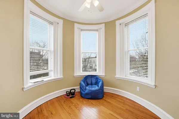 a bedroom with a bed and a fireplace