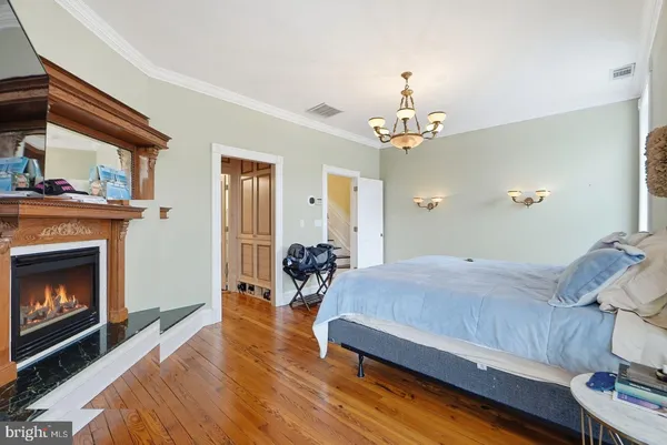 a view of a bathroom with sliding door and front door